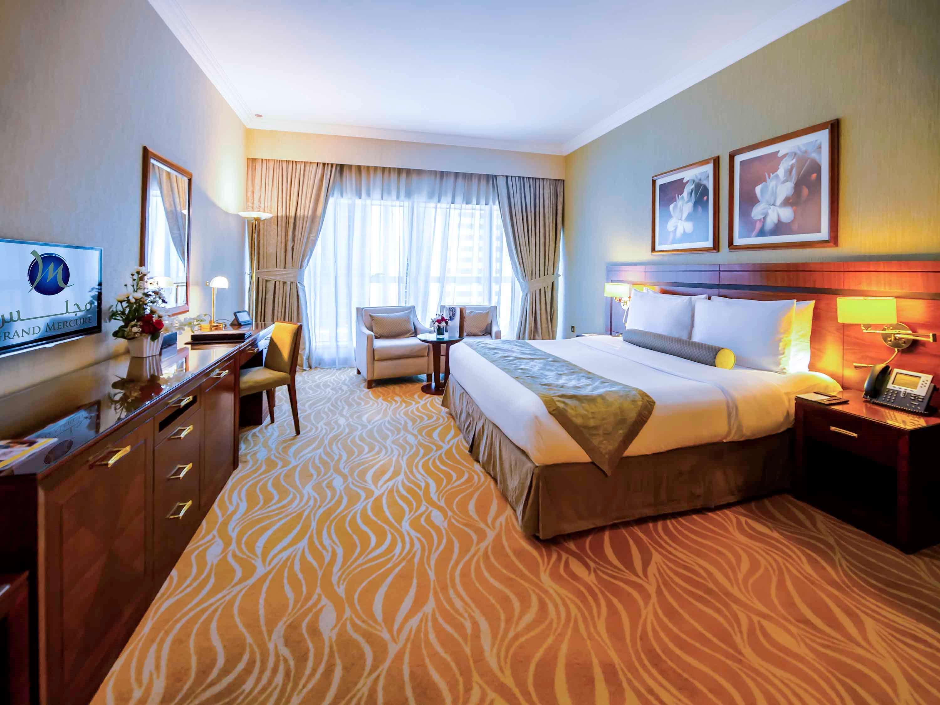 Grand Mercure Residencia Abu Dabi Exterior foto A room at the Jumeirah Creekside Hotel